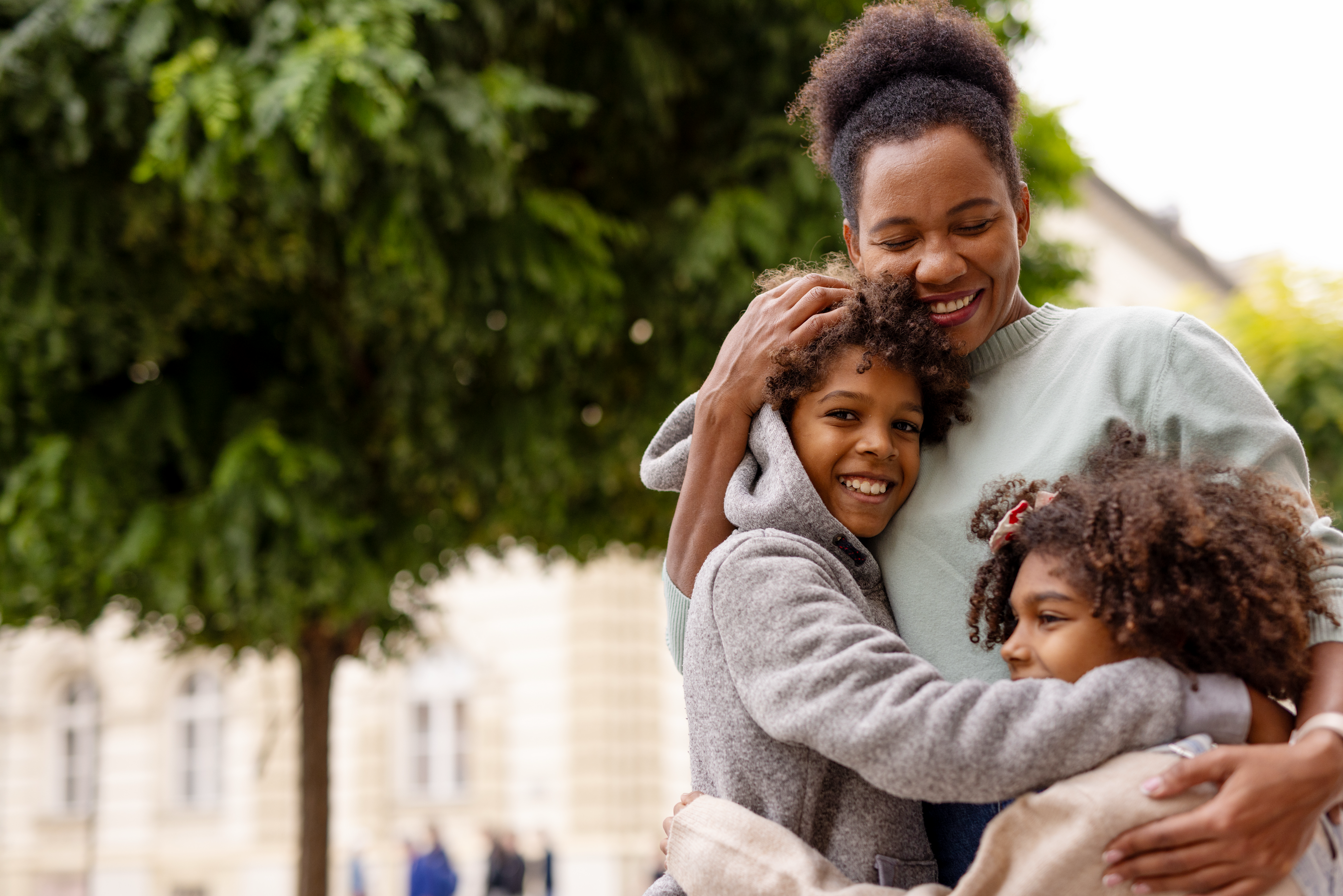 Family at home benefiting from affordable healthcare coverage